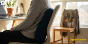 person sitting with lumbar support pillow showing improved posture and back pain relief in comfortable workspace